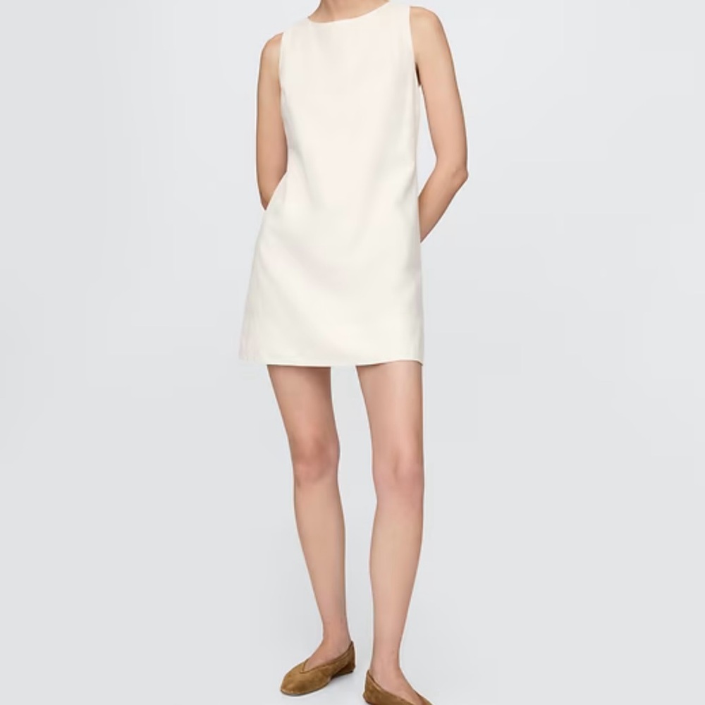 Elegant Cream Sleeveless Dress